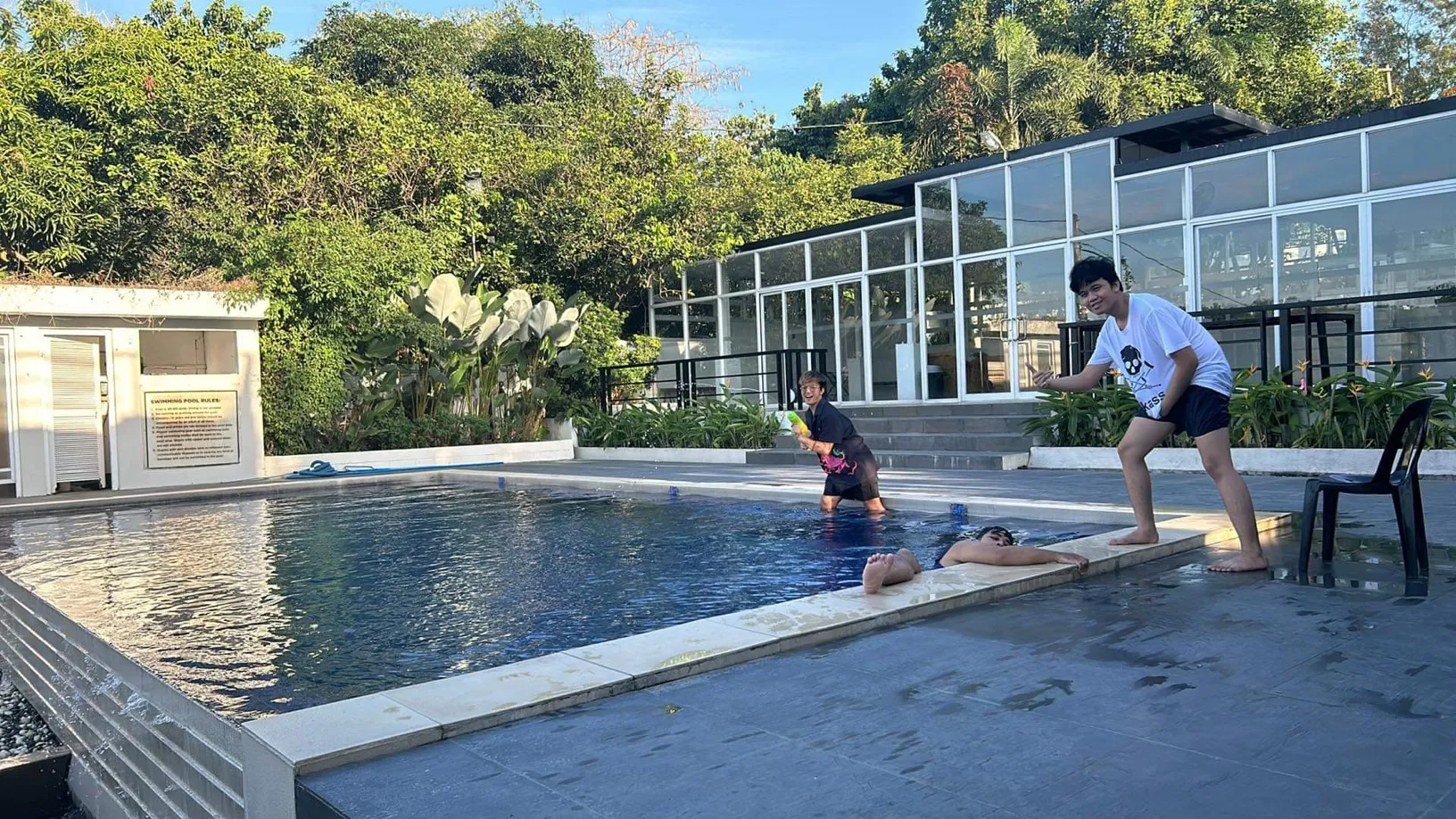 Group of people enjoying in pool Group of people enjoying in pool