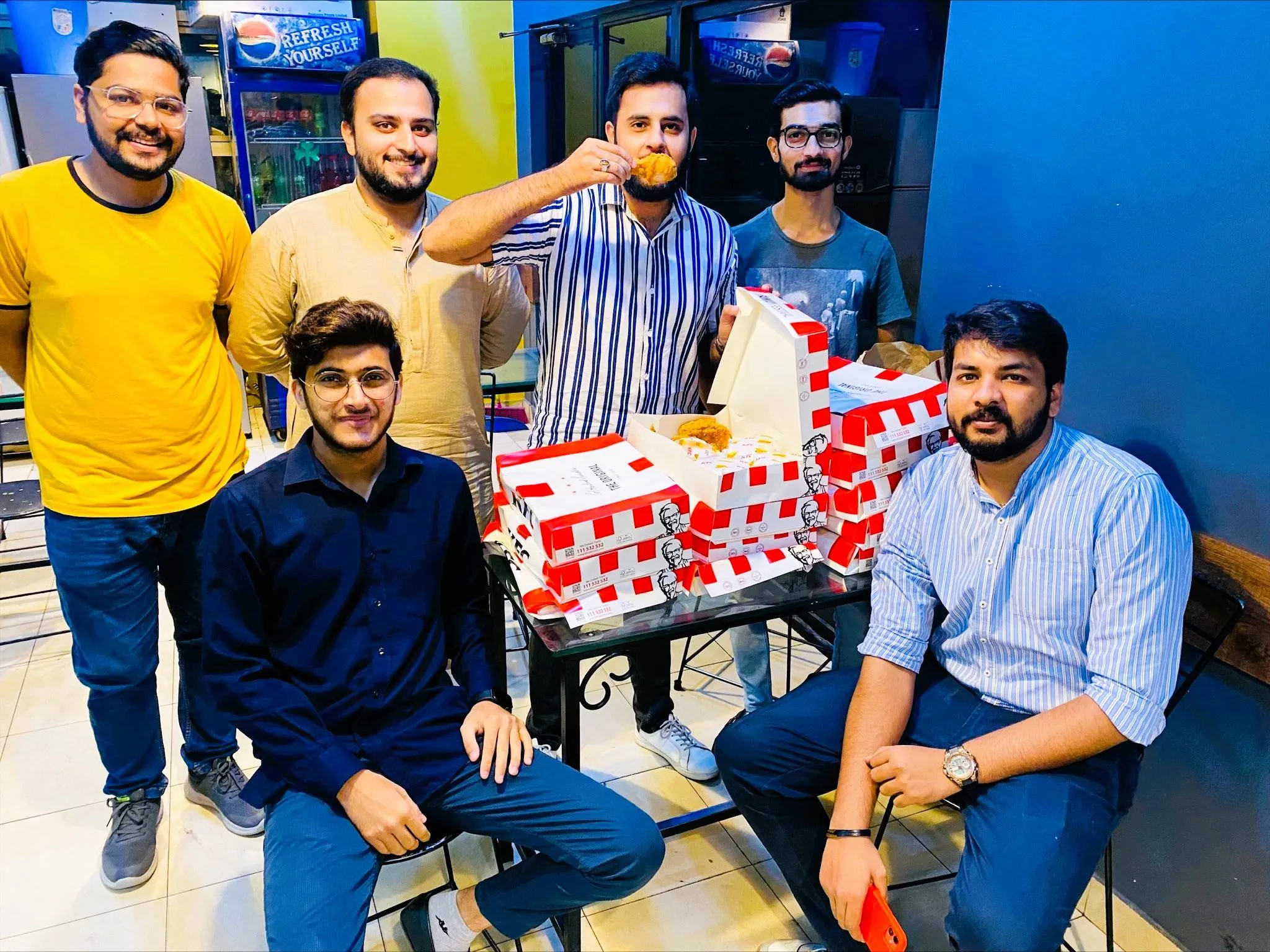 Premier NX employees enjoying lunch at office