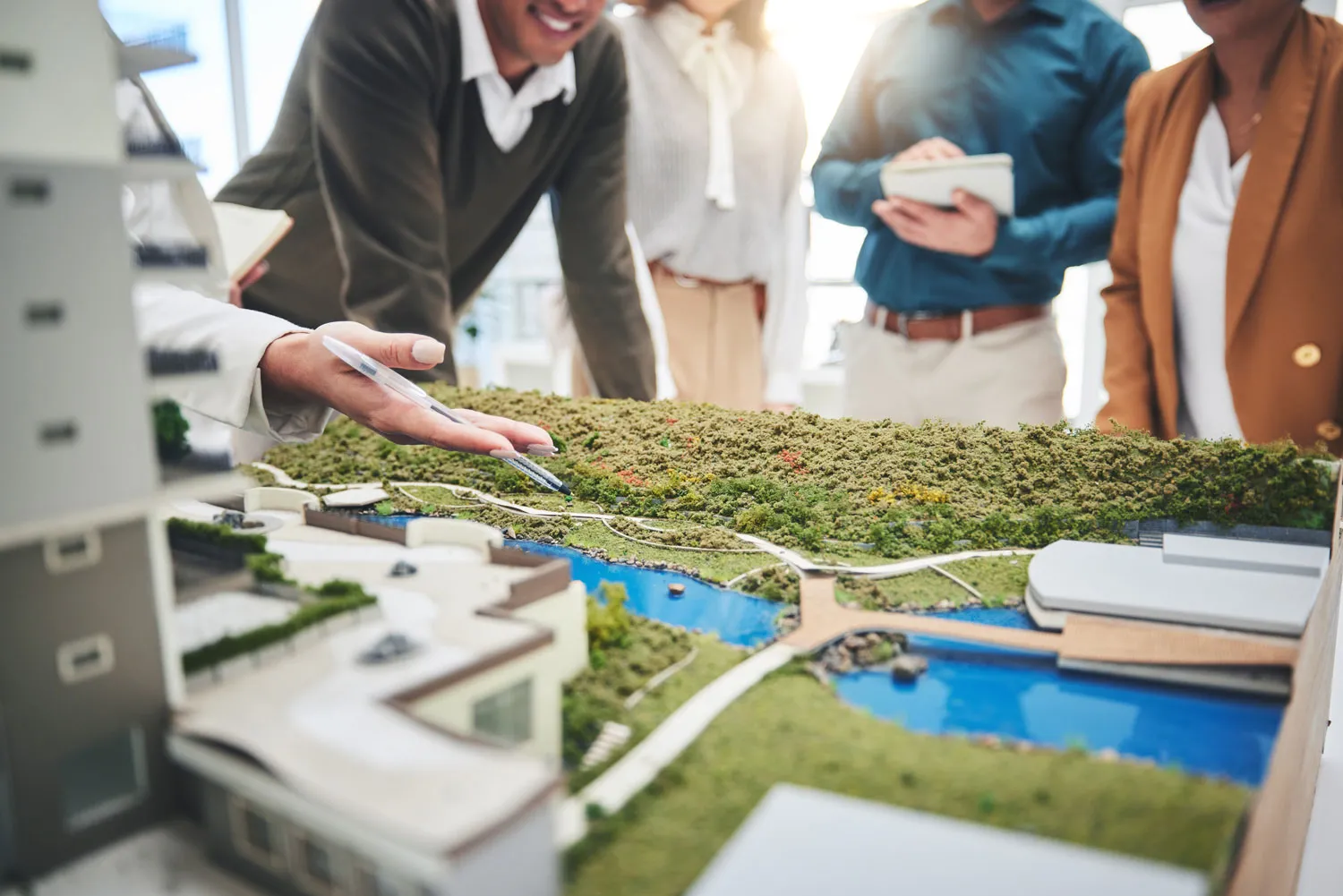 creative-people-hands-and-real-estate-with-3d-mod