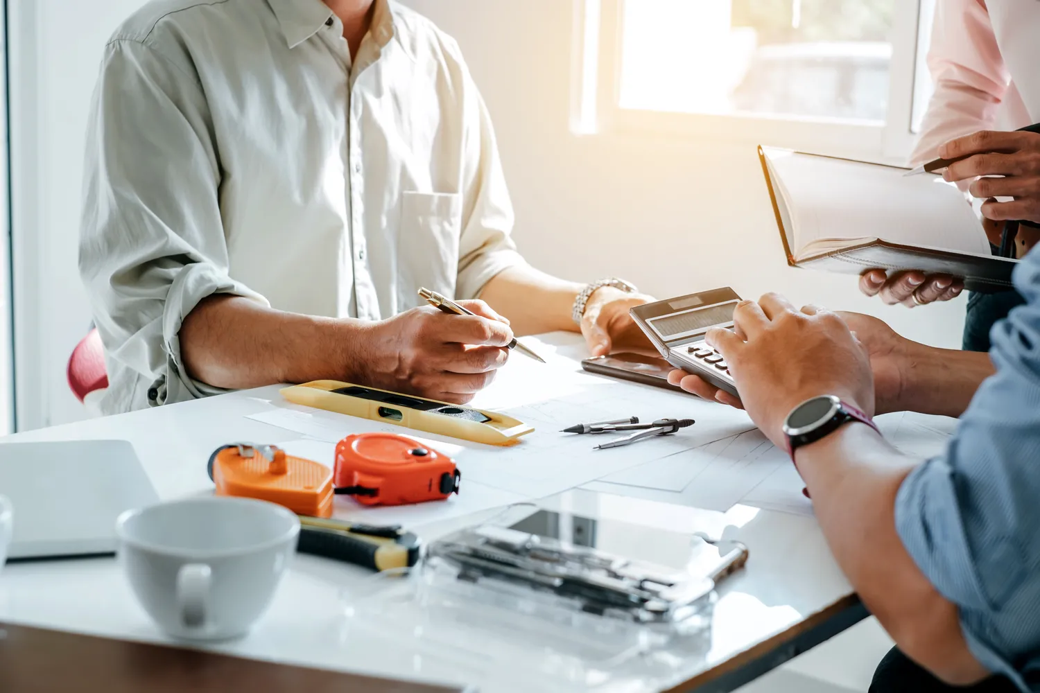 engineer-work-together-at-meeting-and-planning