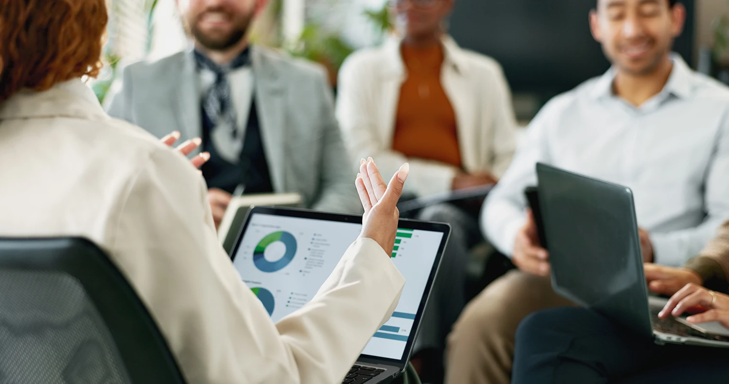 business-presentation-with-laptop-and-chart-discussion